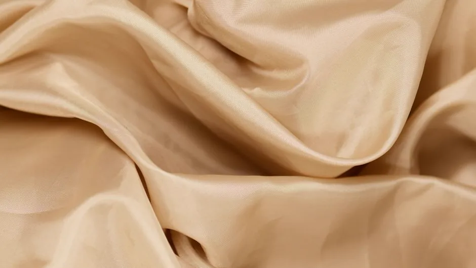 Champagne-coloured satin drape